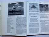 an open book with pictures of airplanes flying in the sky