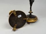 pair of antique brass candlesticks and a bronze plated candle holder