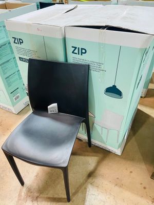 a chair that is sitting in front of a box