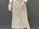 an image of a mannequin wearing a white dress and hat