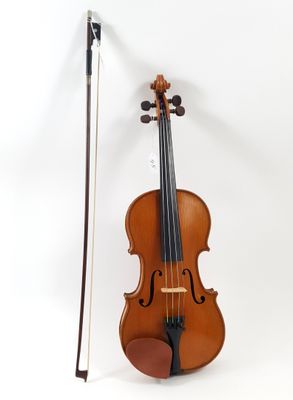 an old violin with a bow and bow rest on a white background