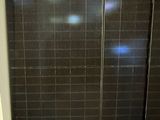 a picture of a bathroom with a toilet and a shower stall