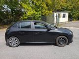 a picture of a black car parked on the side of the road