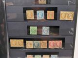 a display case with stamps on it in a display case