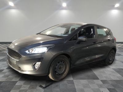 the new ford fiesta is parked in the showroom at the showroom
