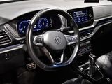 the interior of a car with a steering wheel and dashboard lights