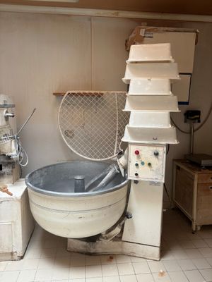 an image of a kitchen with a mixer and other appliances