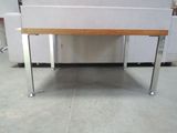a white bench with a wooden seat in a room