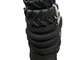 several black tires stacked on top of each other on a white background