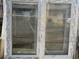 two windows that are sitting on a pallet