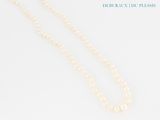 pearl necklace with a gold clasp on a white background