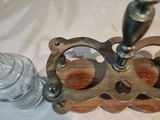 a wine glass holder that has a wine glass in it
