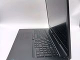 two laptops sitting side by side on a white surface