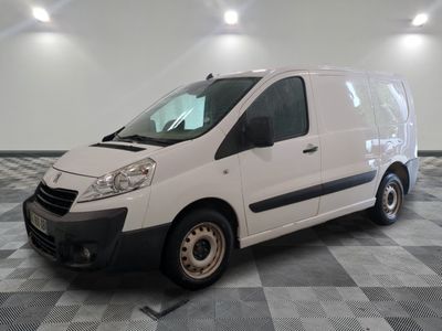 a picture of a white van on a checkered floor