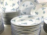 a lot of plates stacked on top of each other
