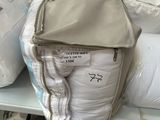 a backpack that is sitting on a shelf in a store