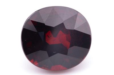 un gros plan d'un losange rouge et noir sur une surface blanche