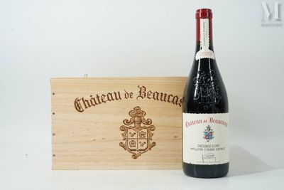 une bouteille de vin posée à côté d'une caisse en bois