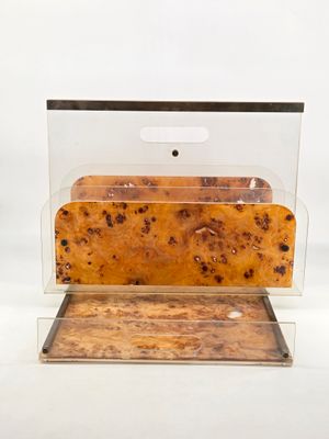 a piece of bread in a clear box on a white surface