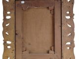 an old wooden picture frame with holes in it on a white background