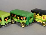 three toy cars that are sitting next to each other