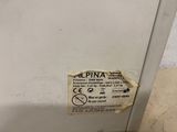 a label on the door of a refrigerator that has a sticker on it
