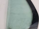 a picture of a broken glass window with a hole in it