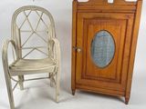 two miniature chairs and a cabinet on a white background