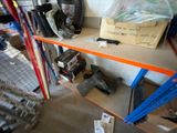 a shelf that has a lot of tools on it
