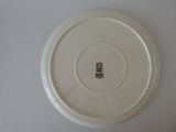 a white plate with a black and white design on it