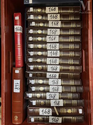 a lot of books that are in a red case