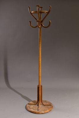 Porte-manteaux en bois thermoformé à huit paternes, le piètement circu - Photo 1