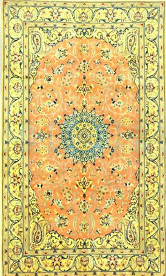 an orange and blue rug with a medallion design on it
