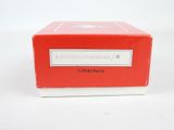 a red box that is sitting on a white surface