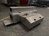 a truck bed that is sitting in the middle of the floor