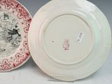 two plates that are sitting side by side on a table