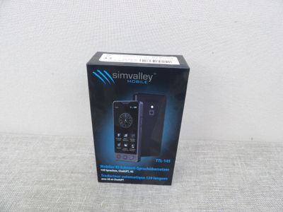 emballage d'un téléphone portable noir posé sur une surface blanche