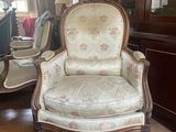 a chair that is sitting in the middle of a room