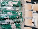 several pairs of socks are wrapped in plastic bags on a table