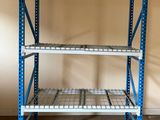 a close up of a metal shelf in a room