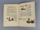 an open book with a picture of a man on horseback