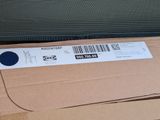 a cardboard box with a sticker on top of it