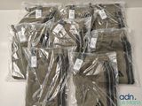 a lot of men ' s pants that are wrapped in plastic