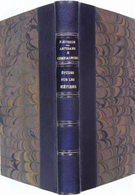 un livre ouvert dont la couverture montre l'image d'un livre