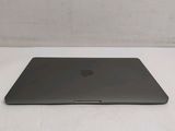 an apple macbook air laptop computer sitting on top of a white table