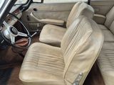 a car that has two seats and a steering wheel in it