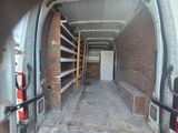 a view of the inside of a van with a ladder