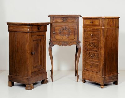 three pieces of furniture that are sitting on a white surface