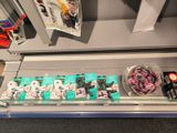 a display of various items on a shelf in a store