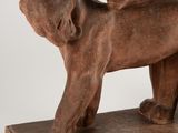 statue of a bear and a bear cub on a wooden base